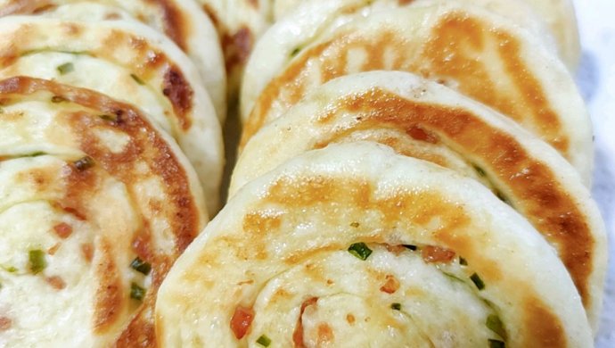 这饼不仅散发着迷人的奶香味，吃一口还能让人灵魂出窍